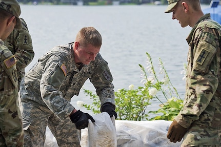 Wisconsin National Guard troops are continuing sandbagging operations in Madison and elsewhere in the state affected by heavy rainfall.