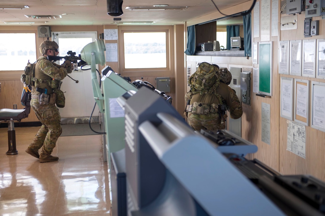 Australian soldiers conduct visit, board, search and seizure operations.