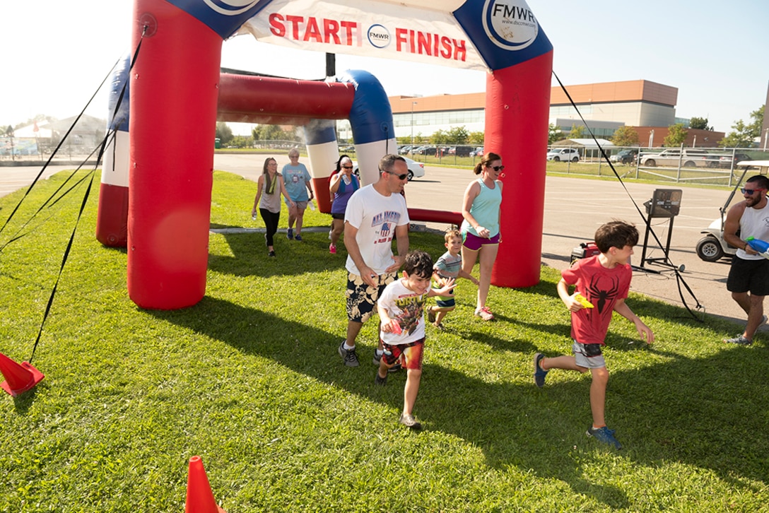 Associates and families beat the heat during 5K