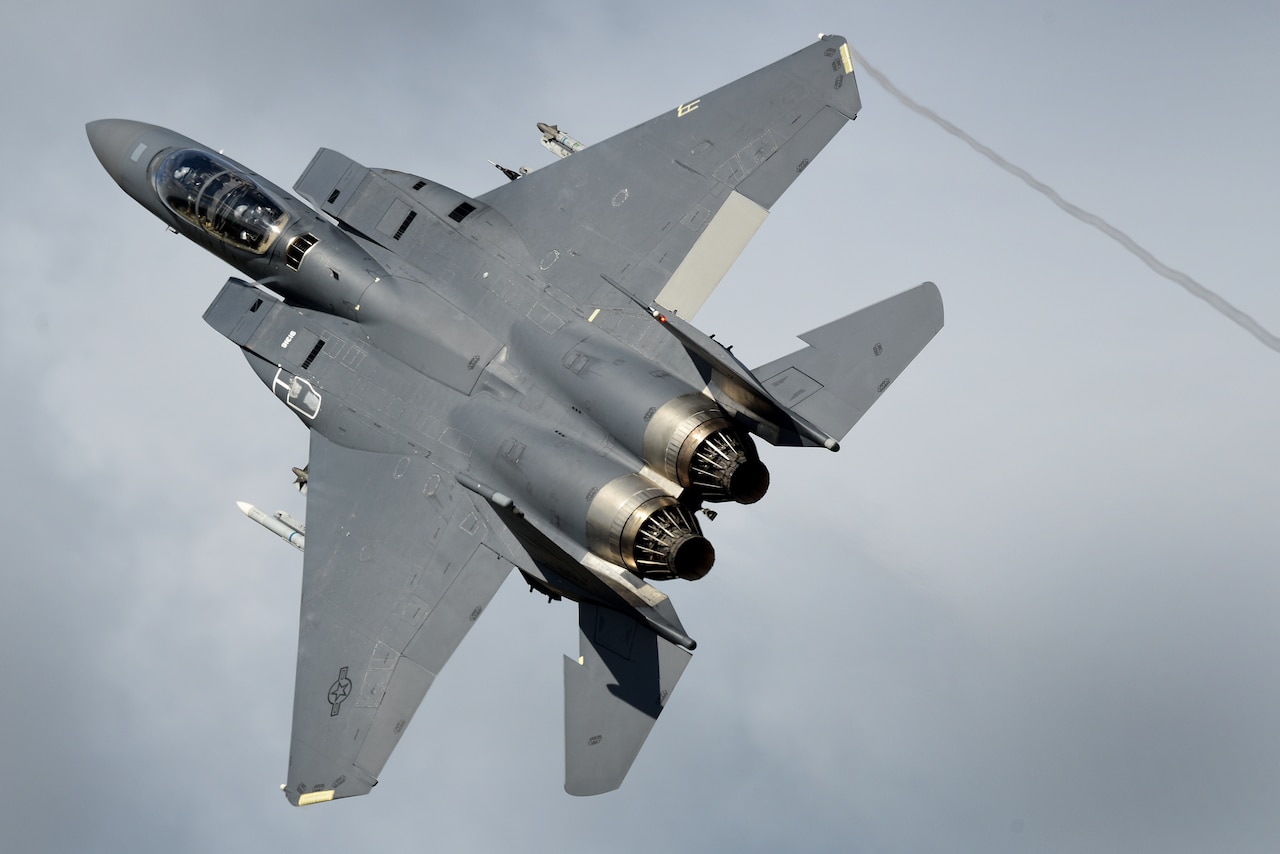 An F-15E Strike Eagle assigned to the 492nd Fighter Squadron flies over Royal Air Force Lakenheath, England, Aug. 17. The 492nd dedicated F-15E Strike Eagles in support of Typhoon Warrior, the Royal Air Force’s premier air combat training exercise during the month of August. (U.S. Air Force photo/ Tech. Sgt. Matthew Plew)