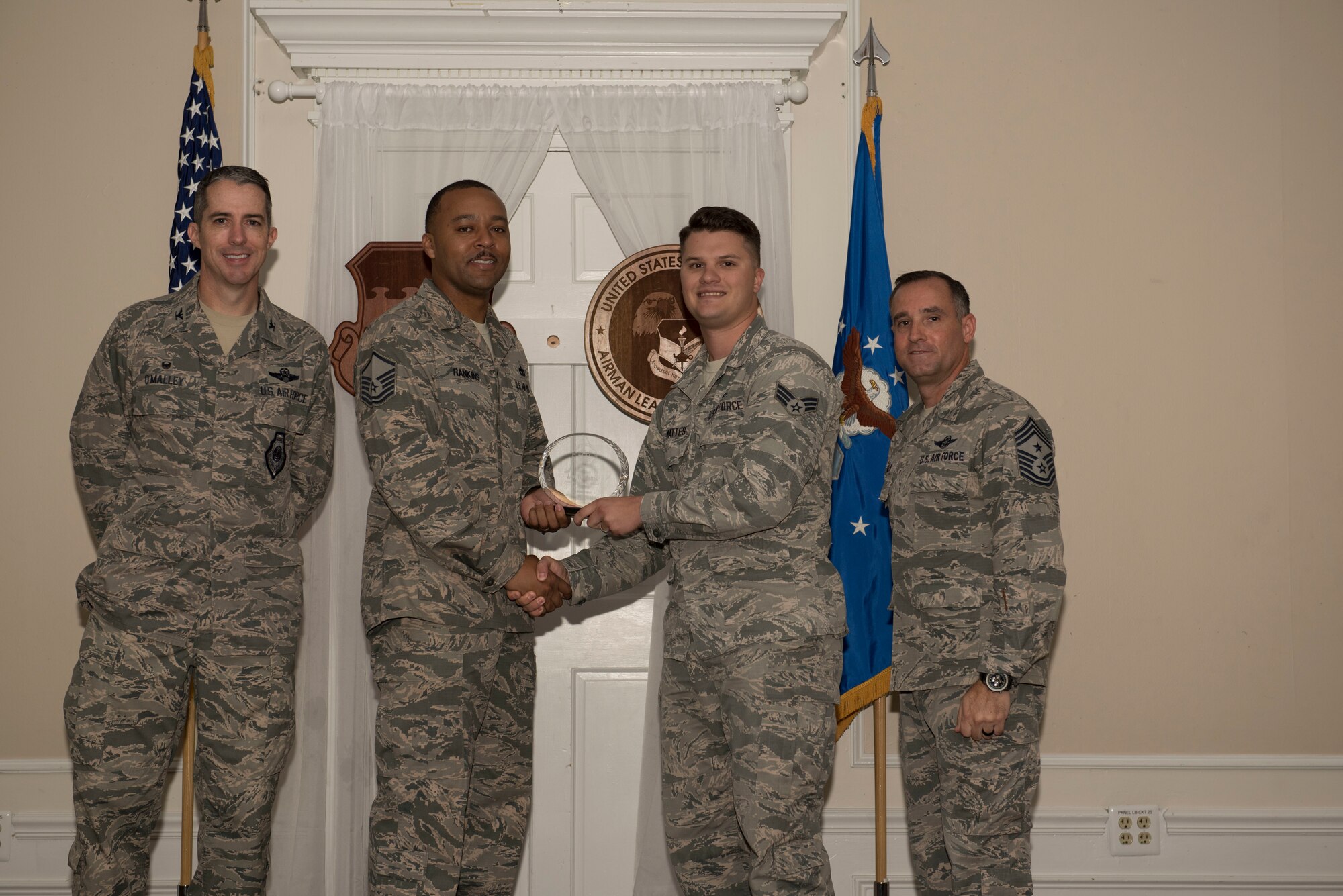 U.S. Air Force Senior Airman Levi Mattes, Airman Leadership School (ALS) student assigned to the 20th Operations Support Squadron, receives the Senior Master Sgt. David B. Reid ALS Academic Achievement Award during the ALS Class 18-6 graduation ceremony at Shaw Air Force Base, S.C., Aug. 23, 2018.