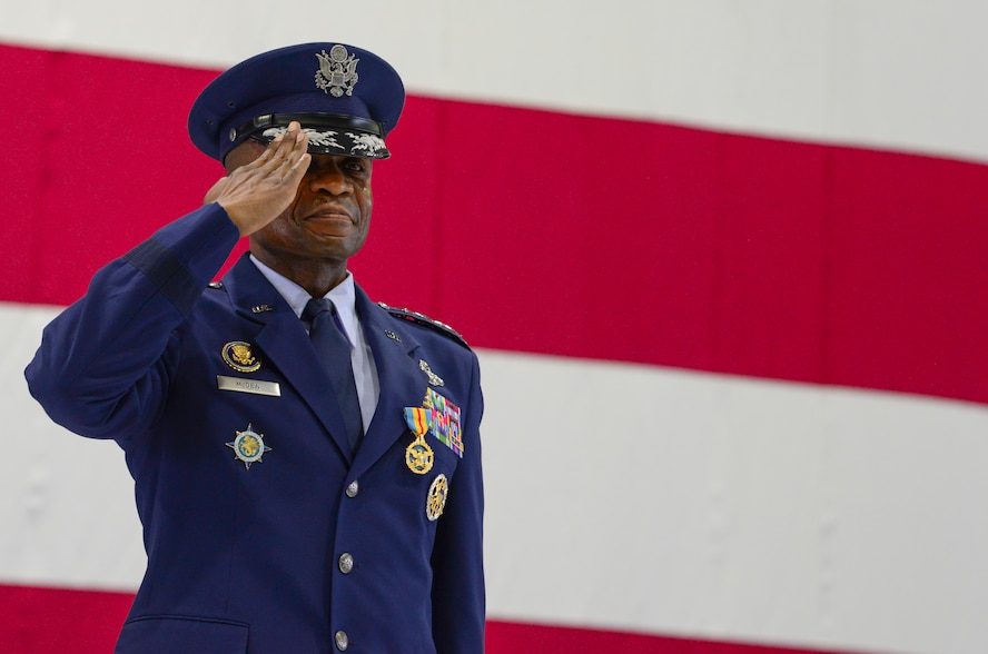 U.S. Air Force Gen. Darren W. McDew renders a final salute to members of U.S. Transportation Command during a change of command ceremony at Scott Air Force Base, Illinois, Aug. 24, 2018.