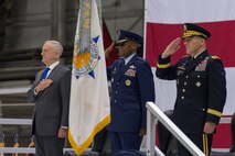 U.S. Secretary of Defense James N. Mattis (left), U.S. Air Force Gen. Darren W. McDew (center) and U.S. Army Gen. Stephen R. Lyons (right) pay respect to the colors during a U.S. Transportation Command change of command ceremony at Scott Air Force Base, Illinois, Aug. 24, 2018.