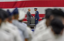 U.S. Secretary of Defense James N. Mattis congratulates retiring U.S. Air Force Gen. Darren W. McDew during the U.S. Transportation Command change of command ceremony, Aug. 24, 2018, at Scott Air Force Base, Illinois.