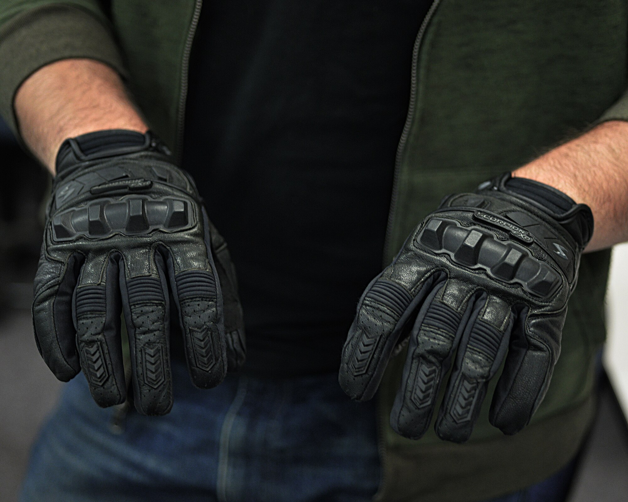 All Air Force military and on-duty civilian personnel are required to wear gloves or mittens made from leather or abrasion-resistant material on and off a military installation.