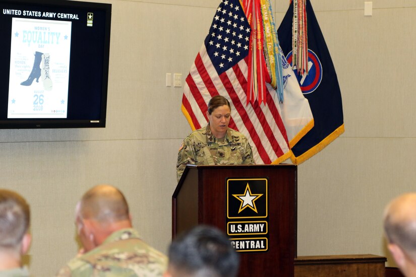 Lt. Col. Riley Matthews, the Headquarters and Headquarters Battalion commander, introduces the guest speaker at the Women’s Equality Day observance Aug 22nd at Patton Hall on Shaw Air Force Base, S.C.