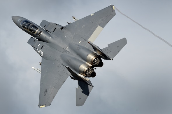 An F-15E Strike Eagle assigned to the 492nd Fighter Squadron flies over RAF Lakenheath, England, Aug. 17, 2018. The squadron sent F-15E Strike Eagles to support Typhoon Warrior, the Royal Air Force’s premier air combat training exercise. (U.S. Air Force photo by Tech. Sgt. Matthew Plew)