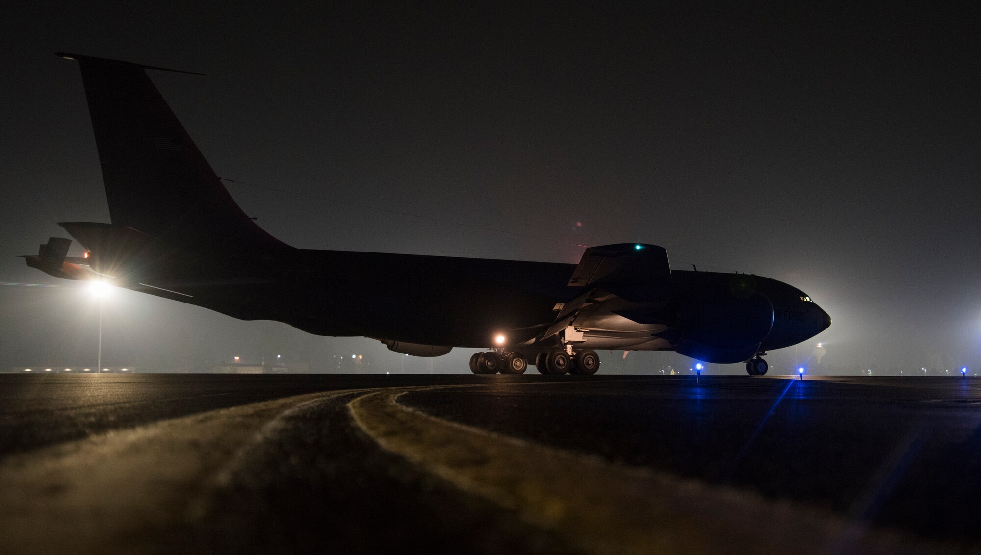 A U.S. Air Force KC-135 Stratotanker, assigned to the 92d Air Refueling Wing, parks on the runway during an exercise at Fairchild Air Force Base, Washington, Aug. 21, 2018. Fairchild’s KC-135 Stratotankers have been utilized for decades to extend the reach of fighters, bombers and other aircraft through aerial refueling. Because of this “air bridge,” U.S. and allied air power can be projected around the world 24/7, 365 days a year. (U.S. Air Force photo by Airman 1st Class Lawrence Sena)