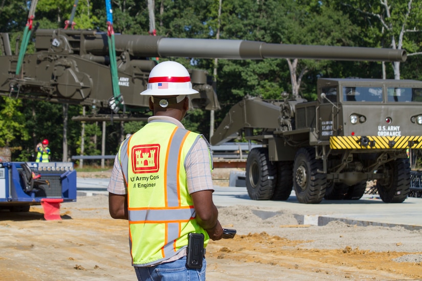 Contractors move "Atomic Annie", an M65-series self-propelled artillery piece into plave at the new Ordnance Training and Heritage Center Building August 8, 2018.