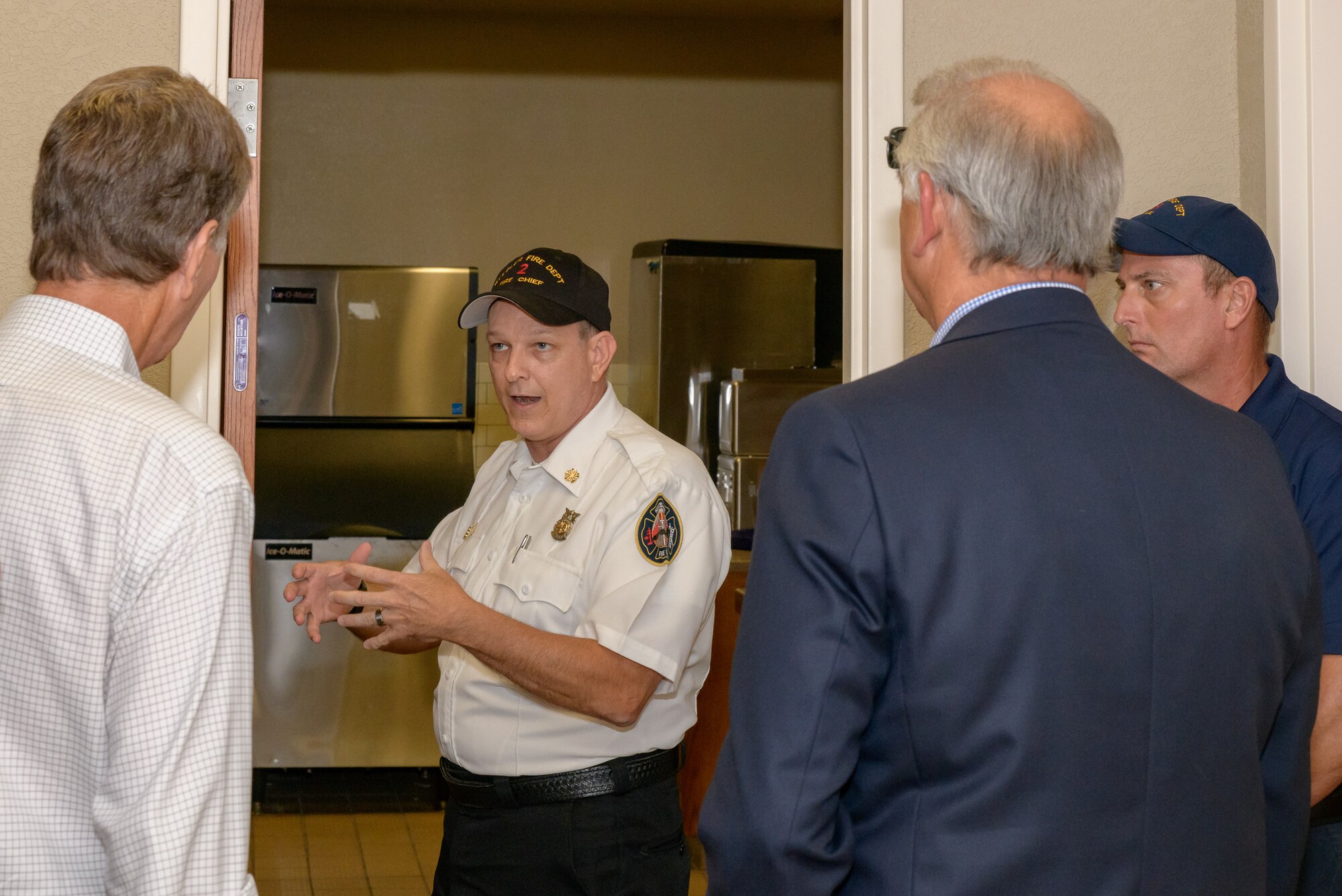 Chief James Donnett, 81st Infrastructure Division fire chief gives a brief on Fire Emergency Services during the 81st Mission Support Group Honorary Commanders tour at the Fire Department at Keesler Air Force Base, Mississippi, Aug. 23, 2018. The honorary commander program is a partnership between base leadership and local civic leaders to promote strong ties between military and civilian leaders. (U.S. Air Force Photo by Andre' Askew)