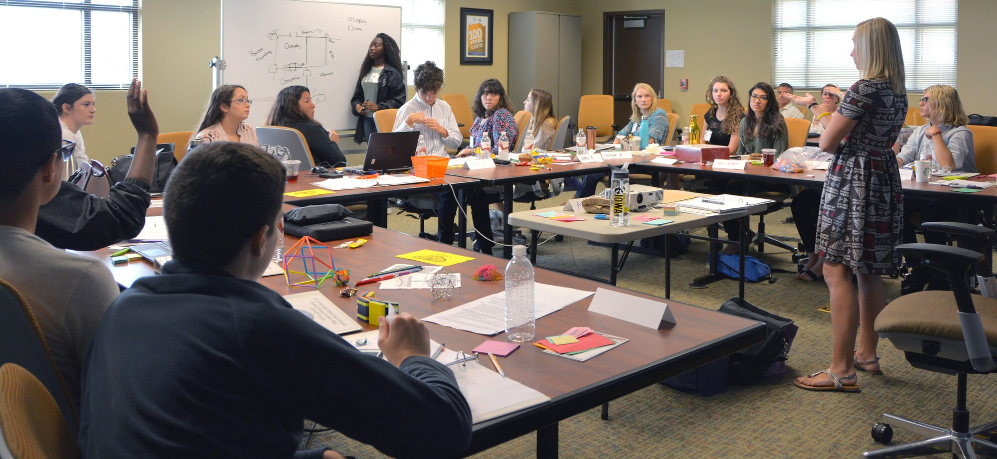 Ashley Powers, teen group facilitator, keeps the teen delegates focused as they collaborate on critical issues, and present possible resolutions during the 2017 Armed Forces Action Plan Forum at the Joint Base San Antonio-Fort Sam Houston IMCOM Academy.