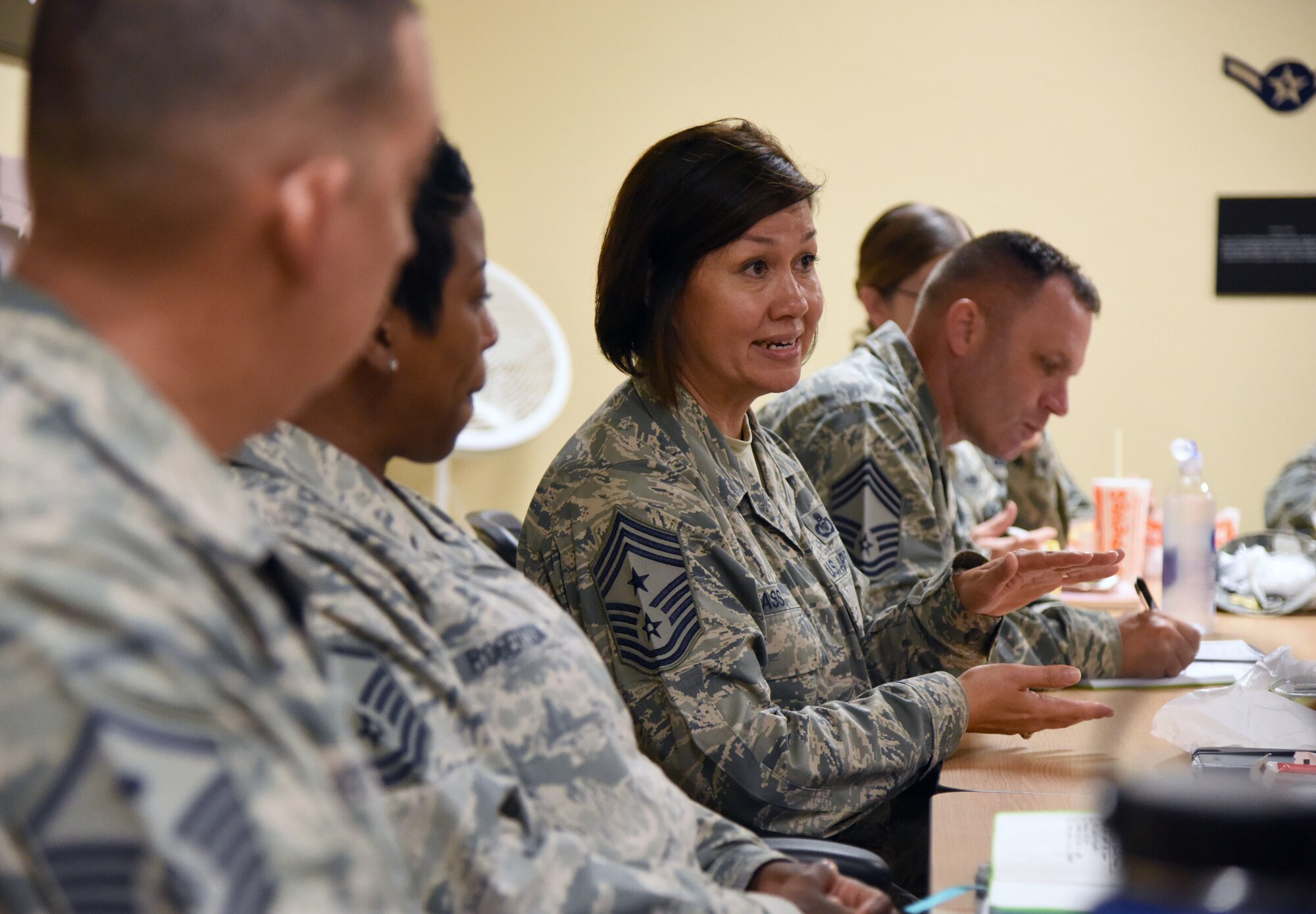 Chief Master Sgt. JoAnne Bass, 2nd Air Force command chief, engages in conversation with Airmen at the Keesler Professional Development Center during an immersion tour on Keesler Air Force Base, Mississippi, Aug. 23, 2018. The purpose of the tour was to become more familiar with Keesler's mission. (U.S. Air Force photo by Kemberly Groue)