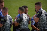 GLENDALE, Colo. – The US Army and the US Air Force rugby teams congratulate each other after the championship rugby game during the Rugbytown 7s tournament. All Five Service branches are represented

individually to compete in the 7th annual RugbyTown 7s competition. U.S. Navy photo by Mass Communication Specialist 2nd Class Daniel Cleary (Released).