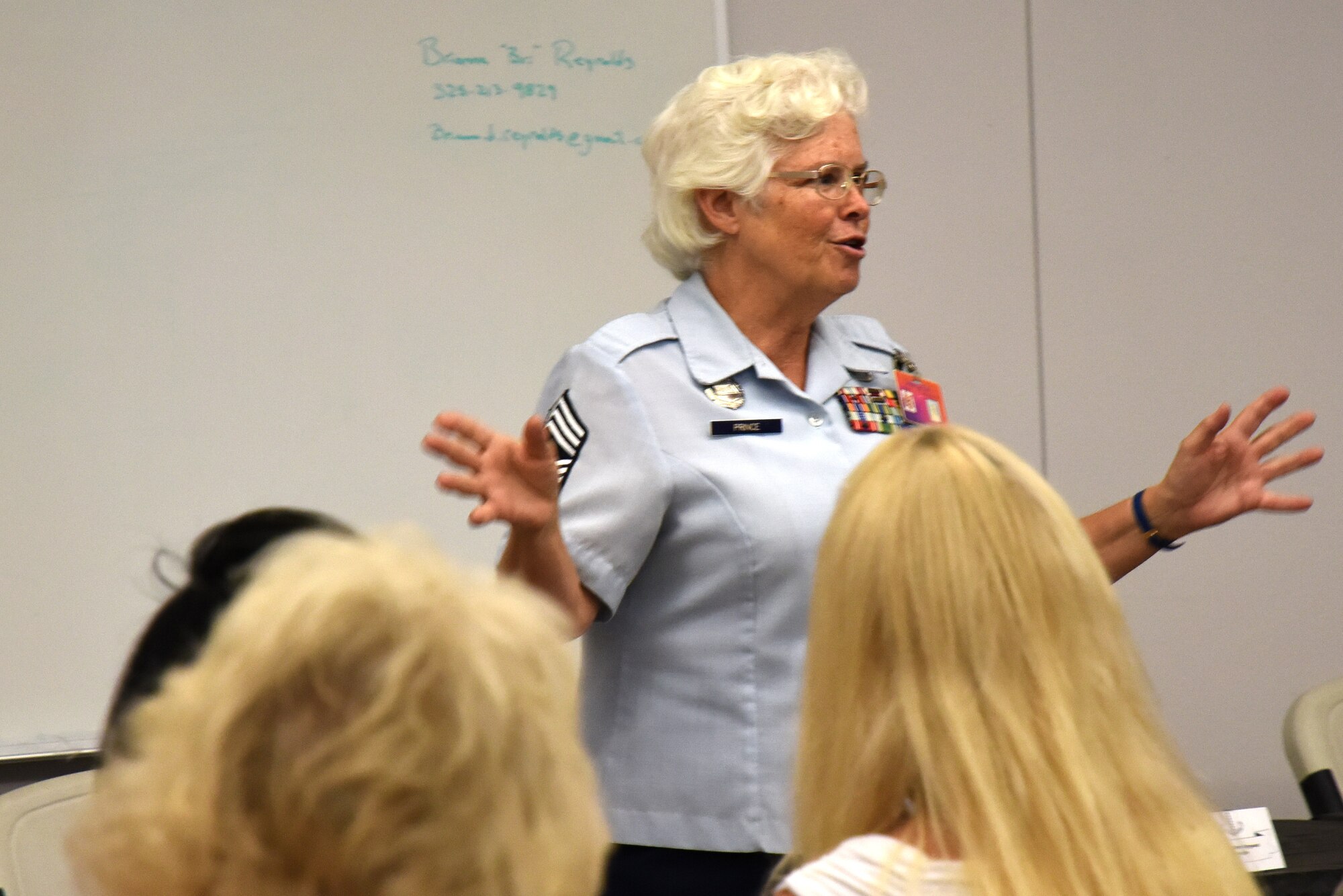 Retired U.S. Air Force Chief Master Sgt. Kathleen Prince, Central High School Junior ROTC instructor, reminisces about her time with the Women in the Air Force program before being allowed to join the regular Air Force during her speech for Women’s Equality day at the Taylor Chapel on Goodfellow Air Force Base, Texas, Aug. 24, 2018. Prince shared moments from her career and how the opportunities for women have increased since she joined in 1975. (U.S. Air Force photo by Airman 1st Class Seraiah Hines/Released)