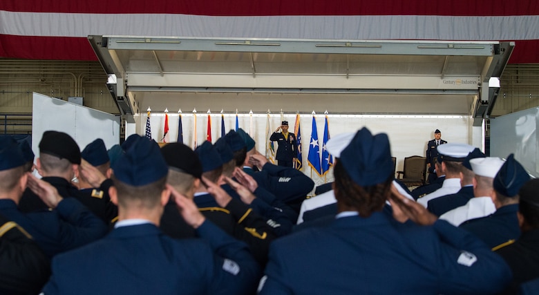 Joint service members render their final salutes to U.S. Air Force Lt. Gen. Ken Wilsbach during a change of command ceremony for Alaskan North American Aerospace Defense Command, Alaskan Command, and the Eleventh Air Force at Joint Base Elmendorf-Richardson, Alaska, Aug. 24, 2018. U.S. Air Force Lt. Gen. Tom Bussiere replaced Wilsbach as commander. Family, friends, Arctic warriors and civic leaders from the surrounding communities attended the ceremony that was jointly-officiated by U.S. Air Force Gen. Terrence J. O’Shaughnessy, commander of the United States Northern Command and North American Aerospace Defense Command, and U.S. Air Force Gen. Charles Q. Brown, the commander of Pacific Air Forces.