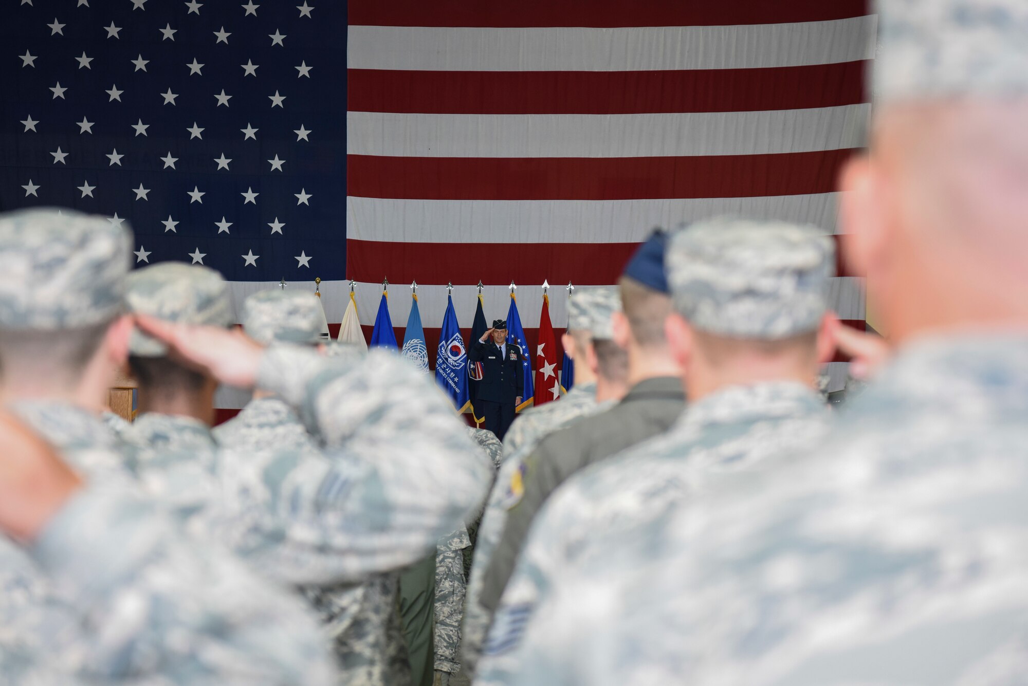 Lt. Gen. Kenneth S. Wilsbach, Deputy Commander, U.S. Forces Korea/ Commander, Air Component Command, United Nations Command/Air Component Command, Combined Forces Command/7th AF, Pacific Air Forces, Osan AB, Republic of Korea, receives his first salute from the men and women of his command during a change of command ceremony at Osan Air Base, Republic of Korea Aug 27, 2018. (U.S. Photo by Senior Airman Savannah L. Waters)