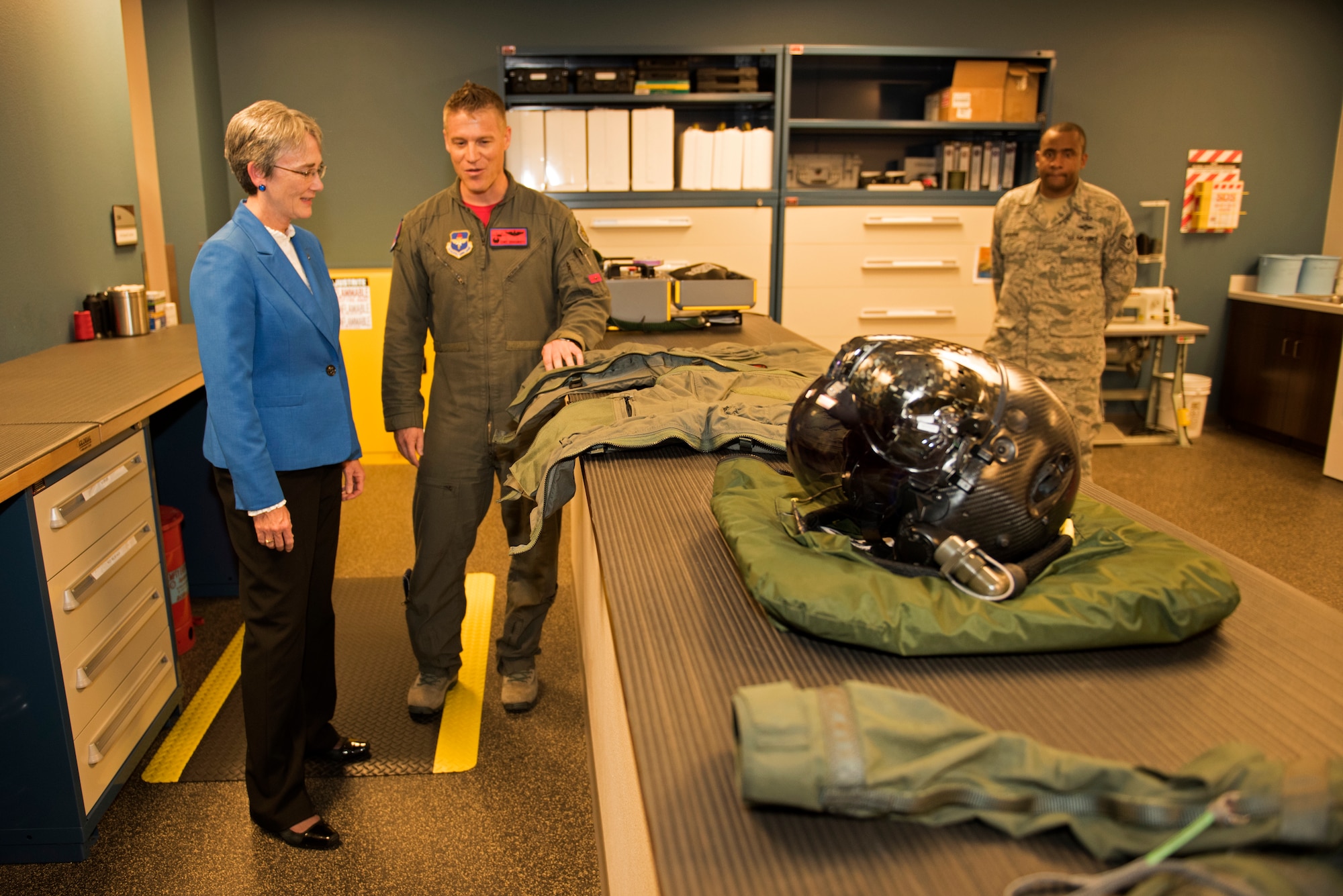 Secretary of the Air Force Heather Wilson receives a brief from Lt. Col. Curtis Dougherty, 63rd Fighter Squadron commander, about flight crew equipment and gear for F-35A Lightning II pilots Aug. 24, 2018, at Luke Air Force Base, Ariz. The 56th Fighter Wing currently trains American and partner nation F-35A pilots in three squadrons, with three additional squadrons planned for the coming years. (U.S. Air Force photo by Senior Airman Ridge Shan)
