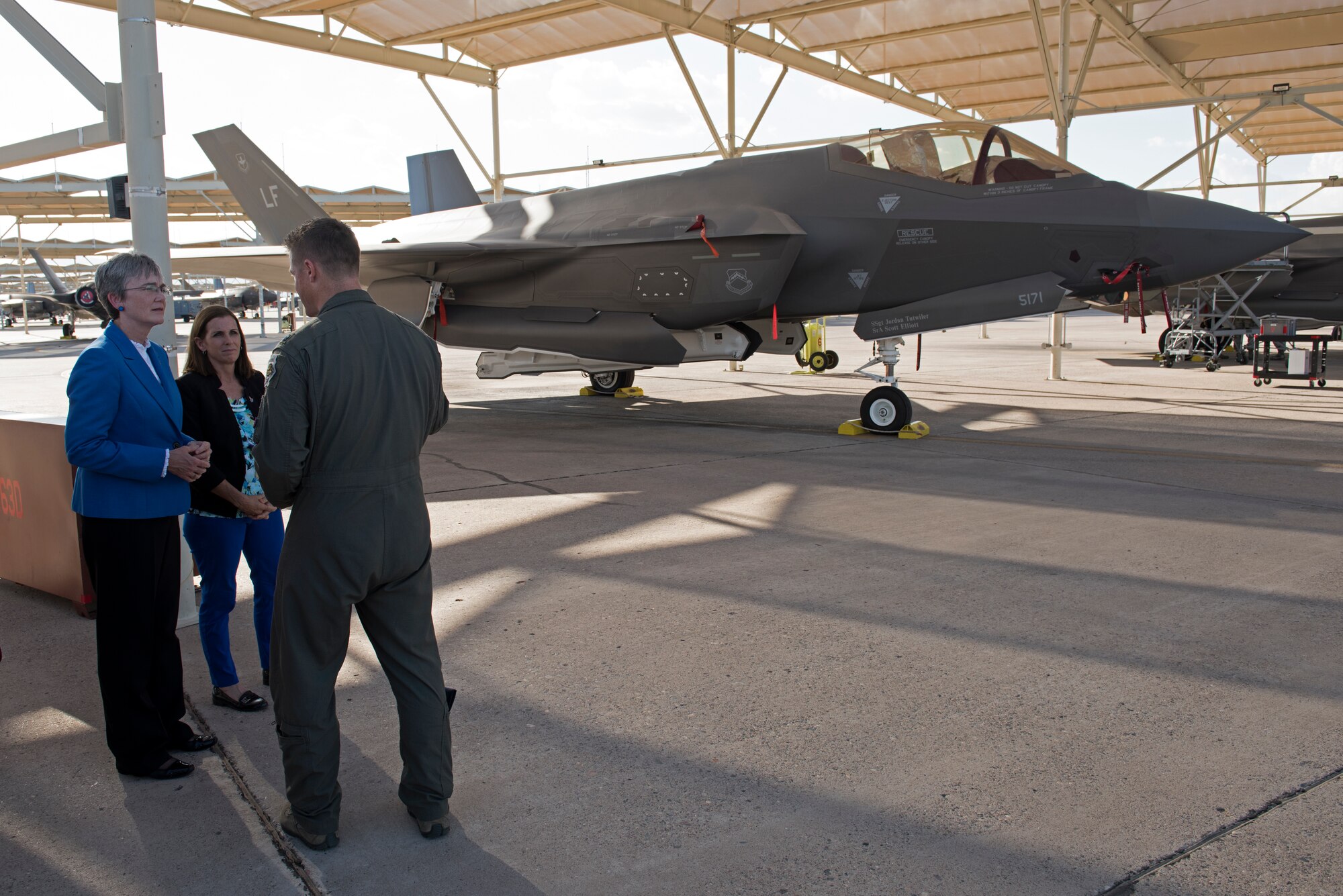 Secretary of the Air Force Heather Wilson speaks to Lt. Col. Curtis Dougherty, 63rd Fighter Squadron commander, about the capabilities of the F-35A Lightning II Aug. 24, 2018, at Luke Air Force Base, Ariz. The 56th Fighter Wing is the largest F-35A wing in the world. (U.S. Air Force photo by Senior Airman Ridge Shan)
