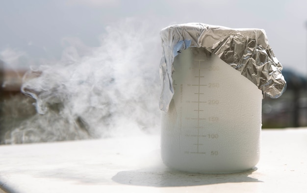 A beaker of liquid oxygen sits filled July 27, 2018, at Kadena Air Base, Japan. The 18th Logistics Readiness Squadron has the only operational cryogenic production plant in the entire U.S. Air Force.