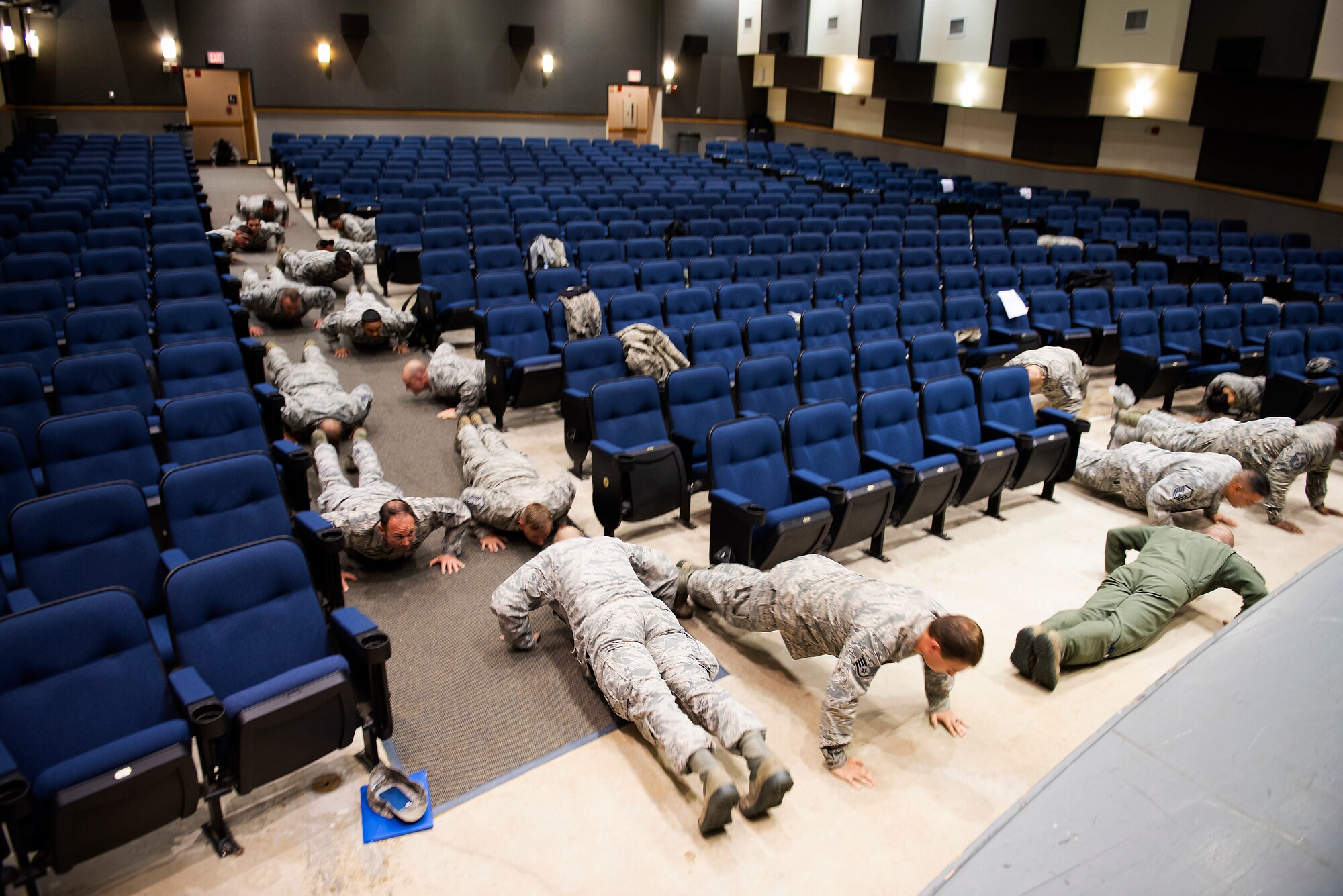 Members of the 8th Fighter Wing participate in memorial push-ups in honor of Master Sgt. John Chapman at Kunsan Air Base, Republic of Korea, Aug. 27, 2018. MSgt. Chapman was a combat controller from the 24th Special Tactics Squadron who was killed in action on March 4, 2002 during the battle of Takur Ghar, otherwise known as Robert’s Ridge. Chapman was posthumously promoted to Master Sergeant, and awarded the Medal of Honor for his sacrifice, which saved more than 20 American service members.