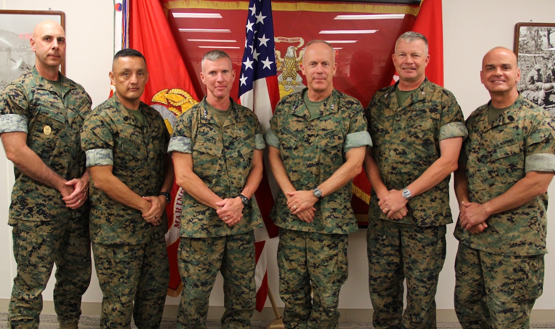 USAG CAMP HUMPHREYS, Korea -- Lt. Gen. Eric M. Smith, commanding general, III Marine Expeditionary Force, and the III MEF command team, visits Maj. Gen. Patrick J. Hermesmann, commander, U.S. Marine Corps Forces Korea, and the MARFORK command team, here Aug. 22. (Photo by Capt. John J. Parry)