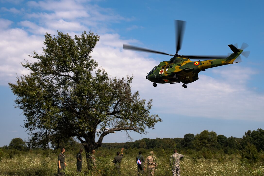 The scenario simulated a downed aircraft, and the pilots had to take specific actions to be rescued. The SERE training was part of Carpathian Summer 2018, a bilateral training exercise designed to enhance interoperability and readiness of forces by conducting combined air operations with the Romanian air force.