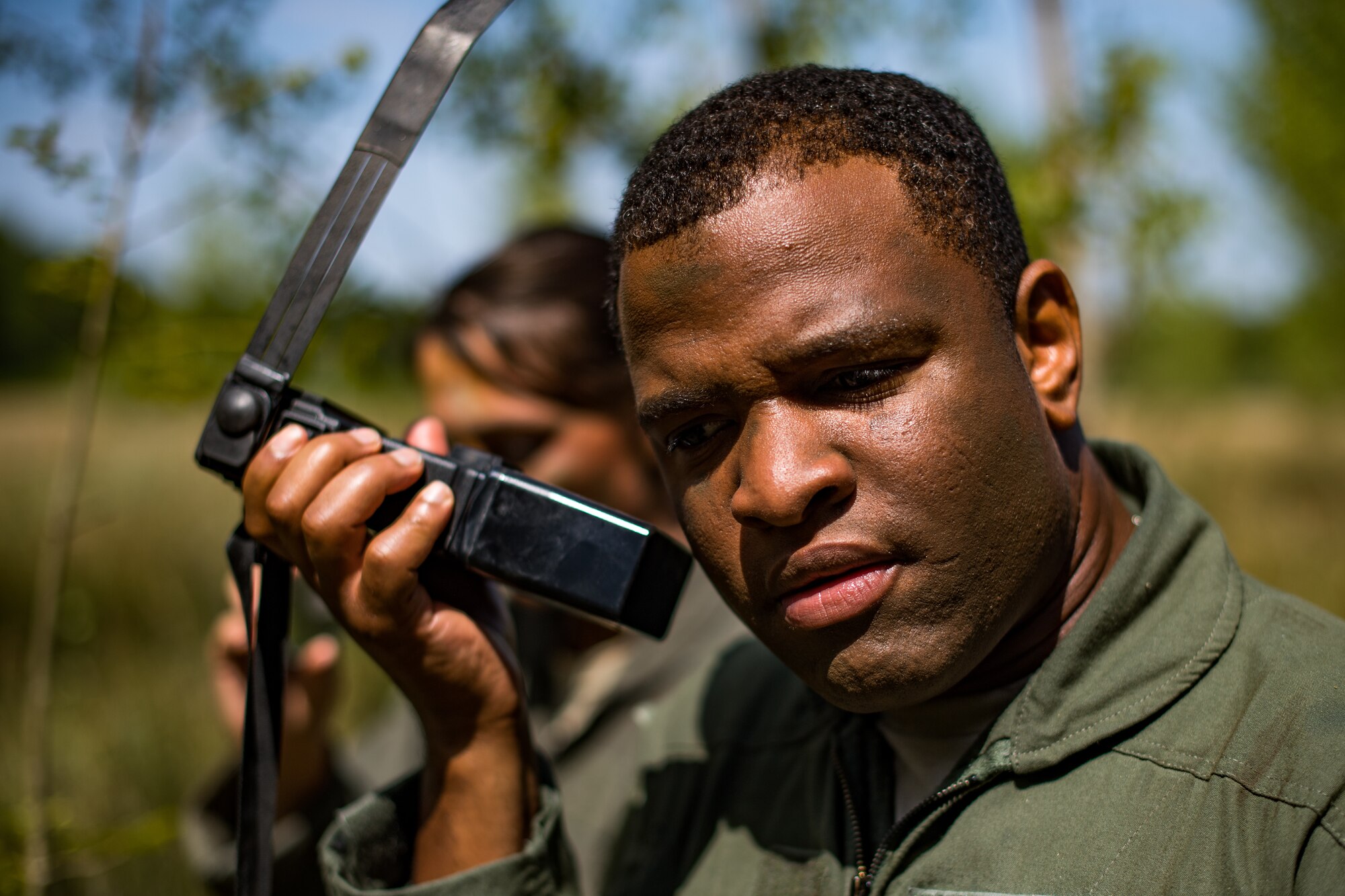 Foley communicated with pilots overhead so him and his fellow Airmen could be found. The SERE training was part of Carpathian Summer 2018, a bilateral training exercise designed to enhance interoperability and readiness of forces by conducting combined air operations with the Romanian air force.