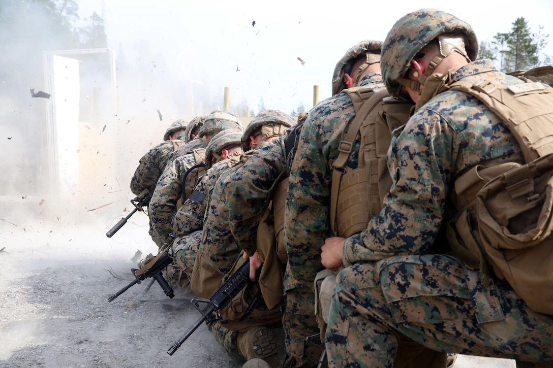 U.S. Marines with Marine Rotational Force-Europe 18.1 detonate explosives during an urban breaching range at Giskas, Norway.