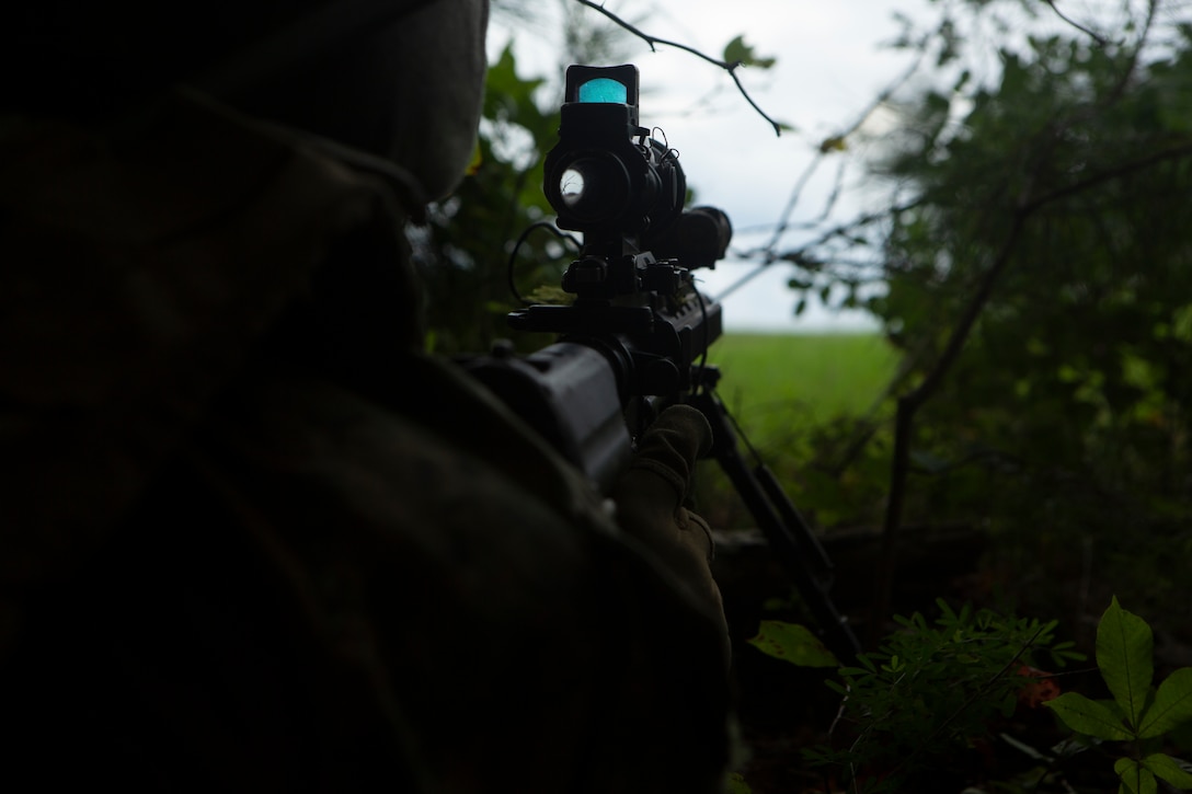A U.S. Marine with Company A., 2nd Light Armored Reconnaissance Battalion, 2nd Marine Division posts security during an Infantry Platoon Battle Course as part of a Deployment for Training exercise at Fort Pickett, Va., Aug. 22, 2018. The unit completed IPBC to increase Light Armored Vehicle crew and scout cohesion, while also preparing for potential real-world contingencies.