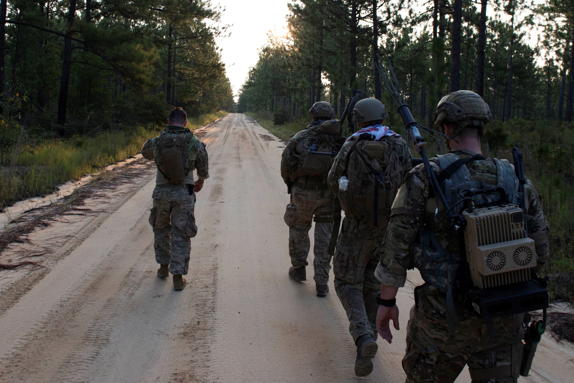 U.S. Air Force Airmen assigned to the 20th Civil Engineer Squadron explosive ordnance disposal flight ruck march at McCrady Army National Guard Base training area near Columbia, S.C., Aug. 23, 2018.