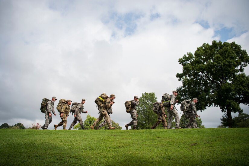 U.S. Air Force Security forces Airmen ruck during Air Combat Command’s Defender Challenge team selection at Joint Base Langley-Eustis, Virginia, Aug. 20, 2018.