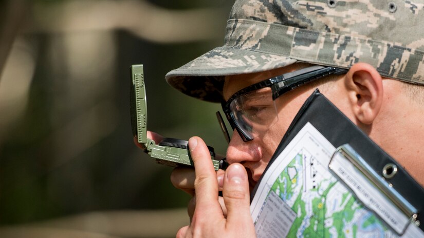 U.S. Air Force Staff Sgt. Anthony Zygmunt, 7th Reconnaissance Squadron alarm monitor, navigates land during Air Combat Command’s Defender Challenge team selection at Joint Base Langley-Eustis, Virginia, Aug. 23, 2018.