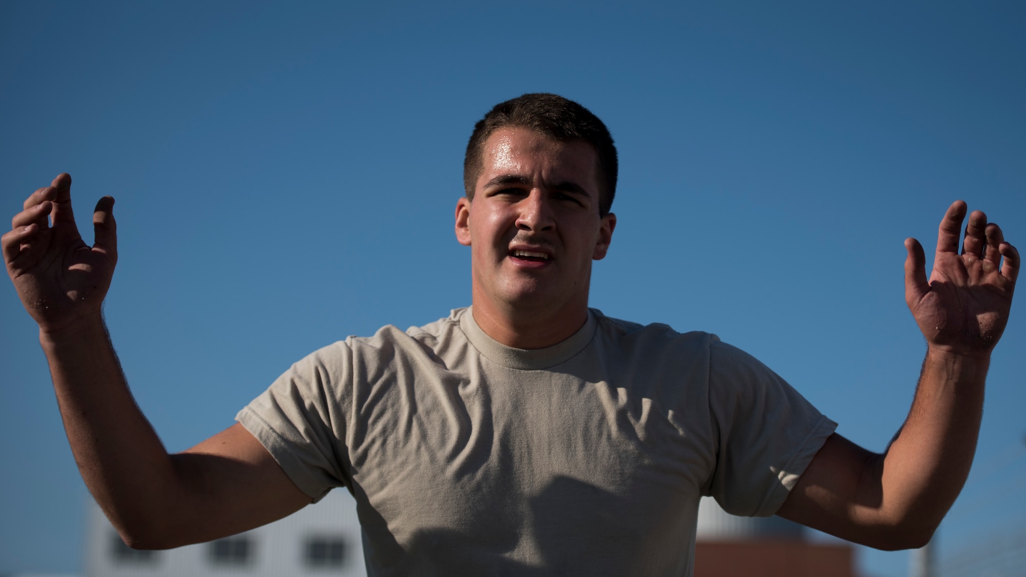 U.S. Air Force Airman 1st Class Jacob D’Agostino, 633rd Security Forces Squadron response force leader, performs burpees during a physical training test as part of Air Combat Command’s Defender Challenge team selection at Joint Base Langley-Eustis, Virginia, Aug. 24, 2018.