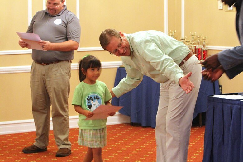 Several military families and their children kept their brains energized over the summer by reading dozens of books as part of the annual summer reading program. More than 100 readers ranging from pre-school to adults completed more than 83,000 minutes of reading. And to celebrate the feat, the Marine Corps Community Services’ Marine and Family Program, held a special awards ceremony for the participants, August 25.