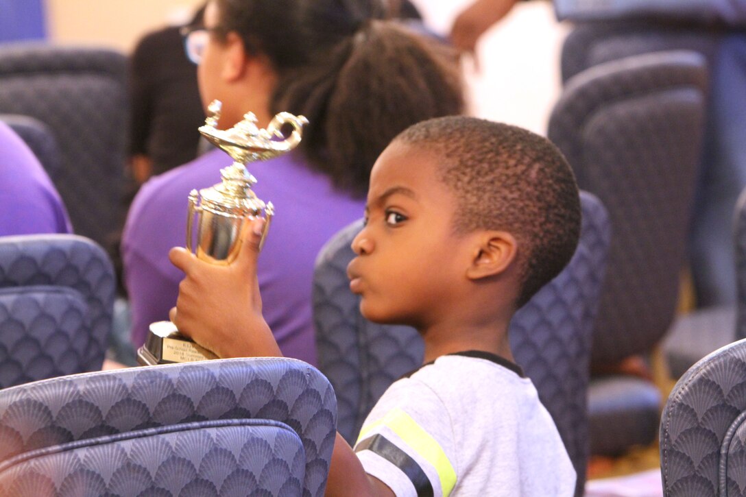 Several military families and their children kept their brains energized over the summer by reading dozens of books as part of the annual summer reading program. More than 100 readers ranging from pre-school to adults completed more than 83,000 minutes of reading. And to celebrate the feat, the Marine Corps Community Services’ Marine and Family Program, held a special awards ceremony for the participants, August 25.