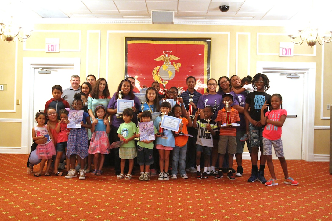 Several military families and their children kept their brains energized over the summer by reading dozens of books as part of the annual summer reading program. More than 100 readers ranging from pre-school to adults completed more than 83,000 minutes of reading. And to celebrate the feat, the Marine Corps Community Services’ Marine and Family Program, held a special awards ceremony for the participants, August 25.