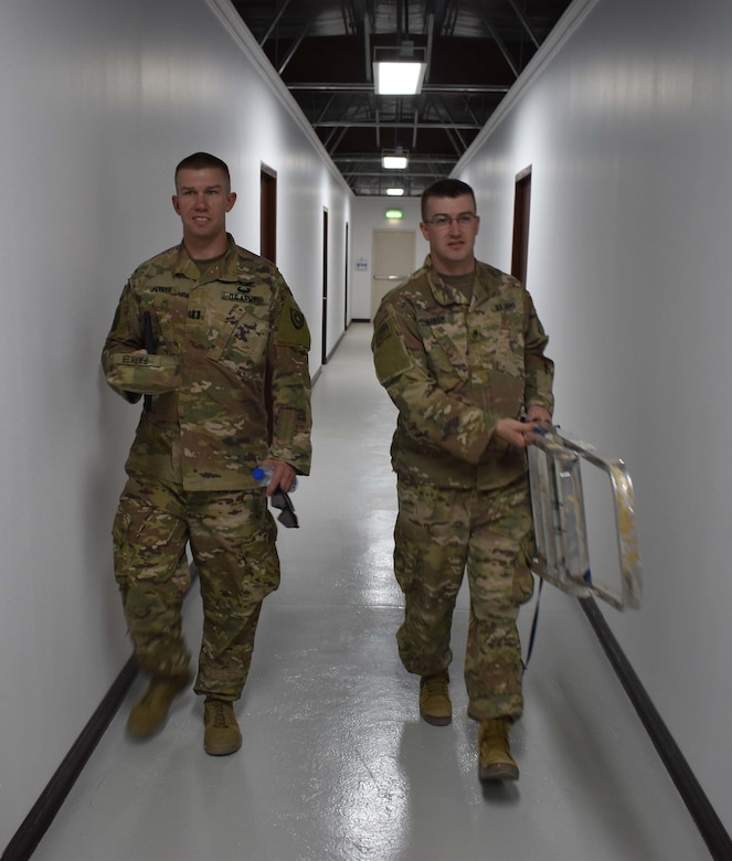 U.S. Army Capt. William Parker and U.S. Army Staff Sgt. Bryan Parker, activated members of the Kentucky Army National Guard 613th Engineering Facilities Detachment, serve as contract officer representatives for Area Support Group-Kuwait Directorate of Public Works during a project phase inspection at Camp Arifjan, Kuwait, August 6, 2018. The Army’s greatest asset is the best people our Nation has to offer.