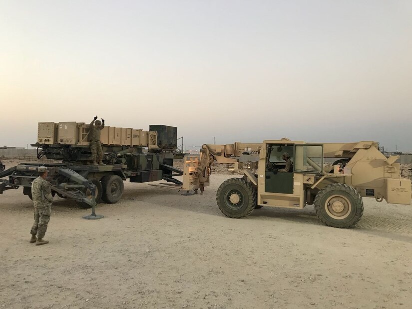 Members of Delta Battery of the 5th Battalion, 52nd Air Defense Artillery, based out of Fort Bliss, Texas, move the patriot missile launching station during their master gunnery certification, Aug. 11-12.