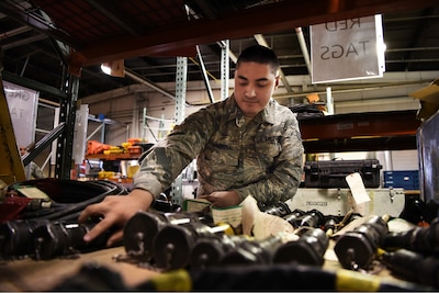 Air Force Senior Airman Nicholas Bagnall, 791st Maintenance Squadron vehicles and equipment section technician, inspects faulty parts at Minot Air Force Base, North Dakota.