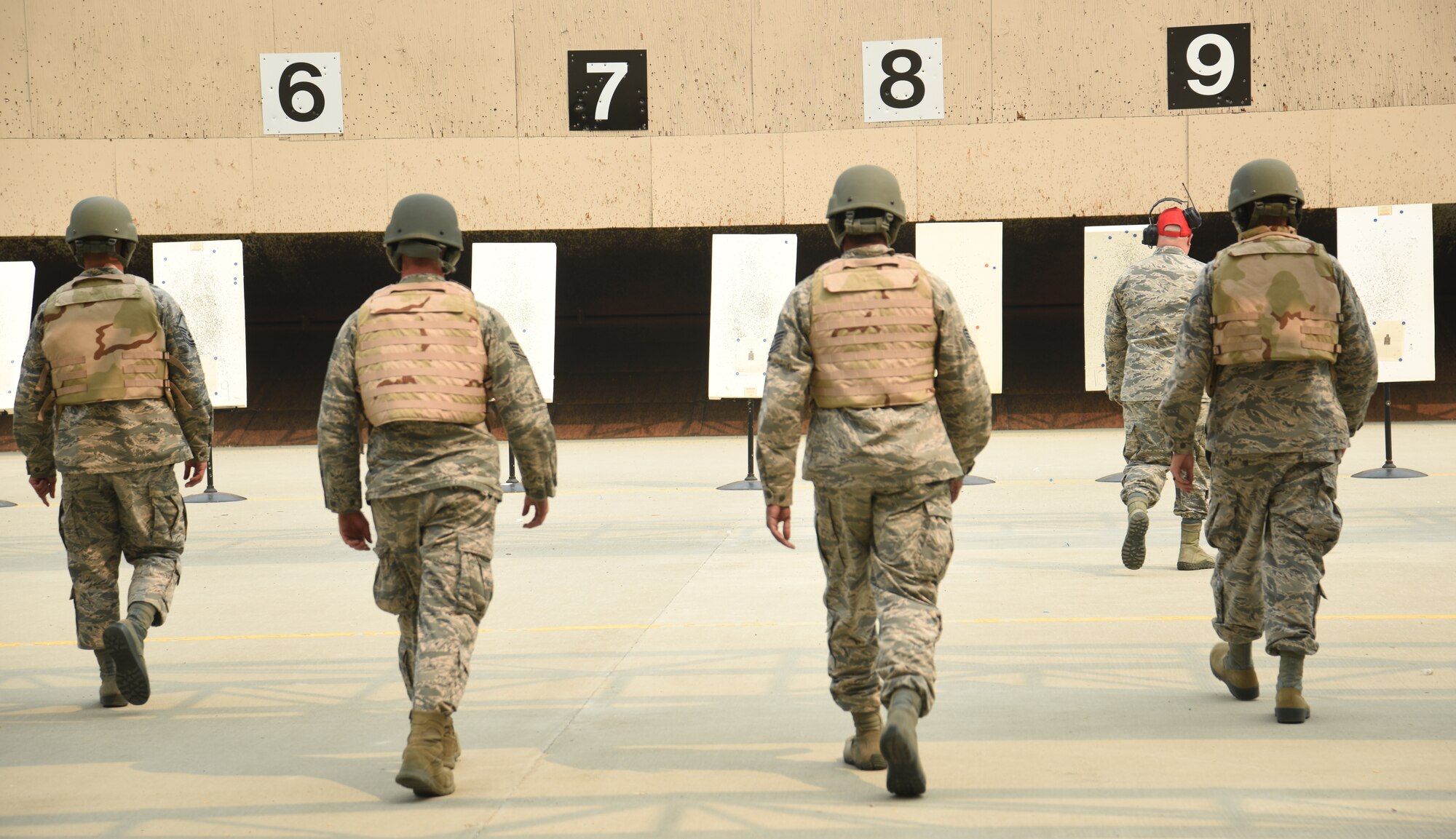 Airmen walk to their targets