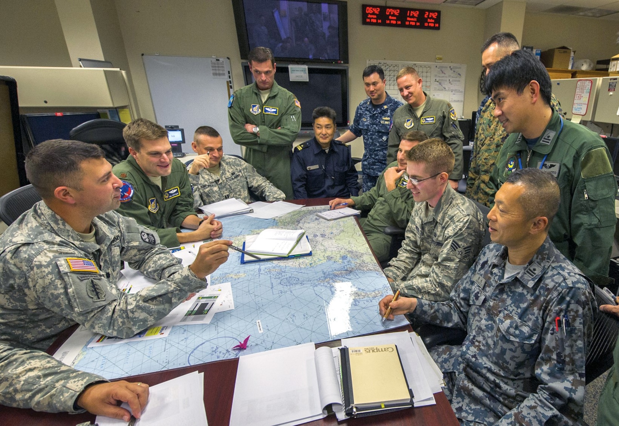 U.S. and international military personnel engage in wargaming and operations planning. (U.S. Air Force/Nathan Allen)