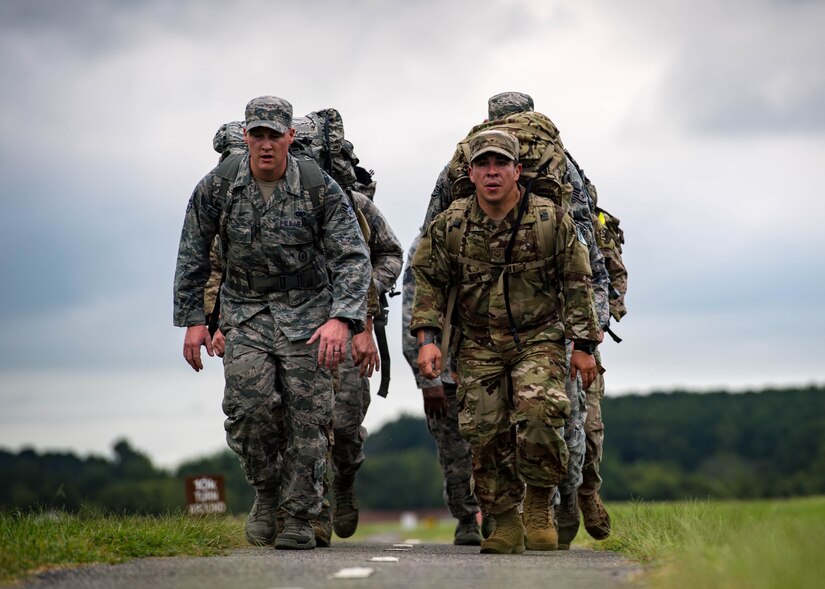 U.S. Air Force Airmen ruck march during Air Combat Command’s Defender Challenge team selection at Joint Base Langley-Eustis, Virginia, August 20, 2018.