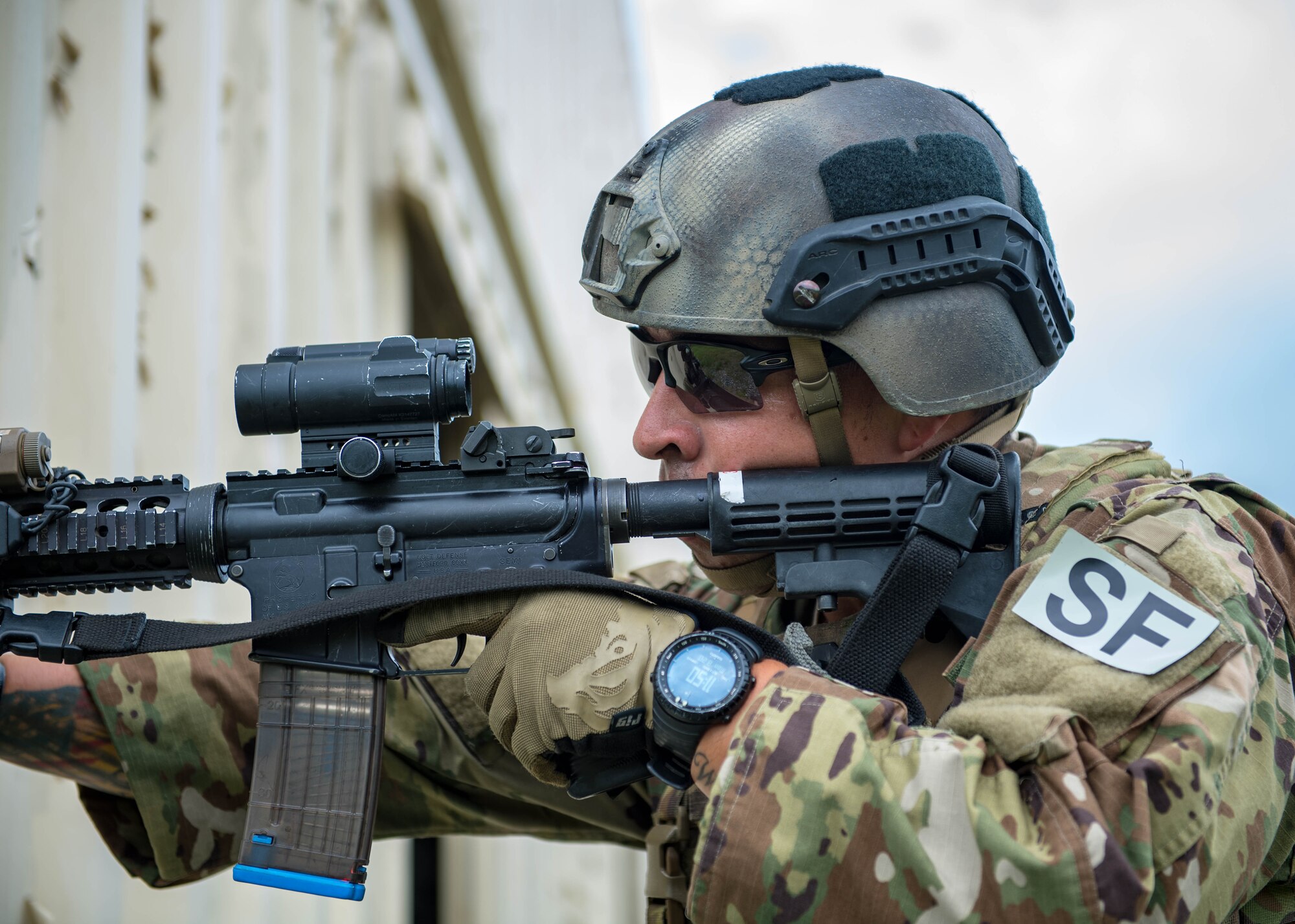 U.S. Air Force Staff Sgt. Paul Rosales, 55th Security Forces Squadron combat arms training and maintenance instructor, clears a building during Air Combat Command’s Defender Challenge team selection at Joint Base Langley-Eustis, Virginia, August 20, 2018.