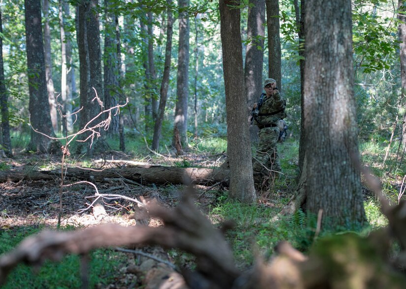 U.S. Air Force Staff Sgt. Paul Rosales, 55th Security Forces Squadron combat arms training and maintenance instructor, navigates land during Air Combat Command’s Defender Challenge team selection at Joint Base Langley-Eustis, Virginia, August 23, 2018.