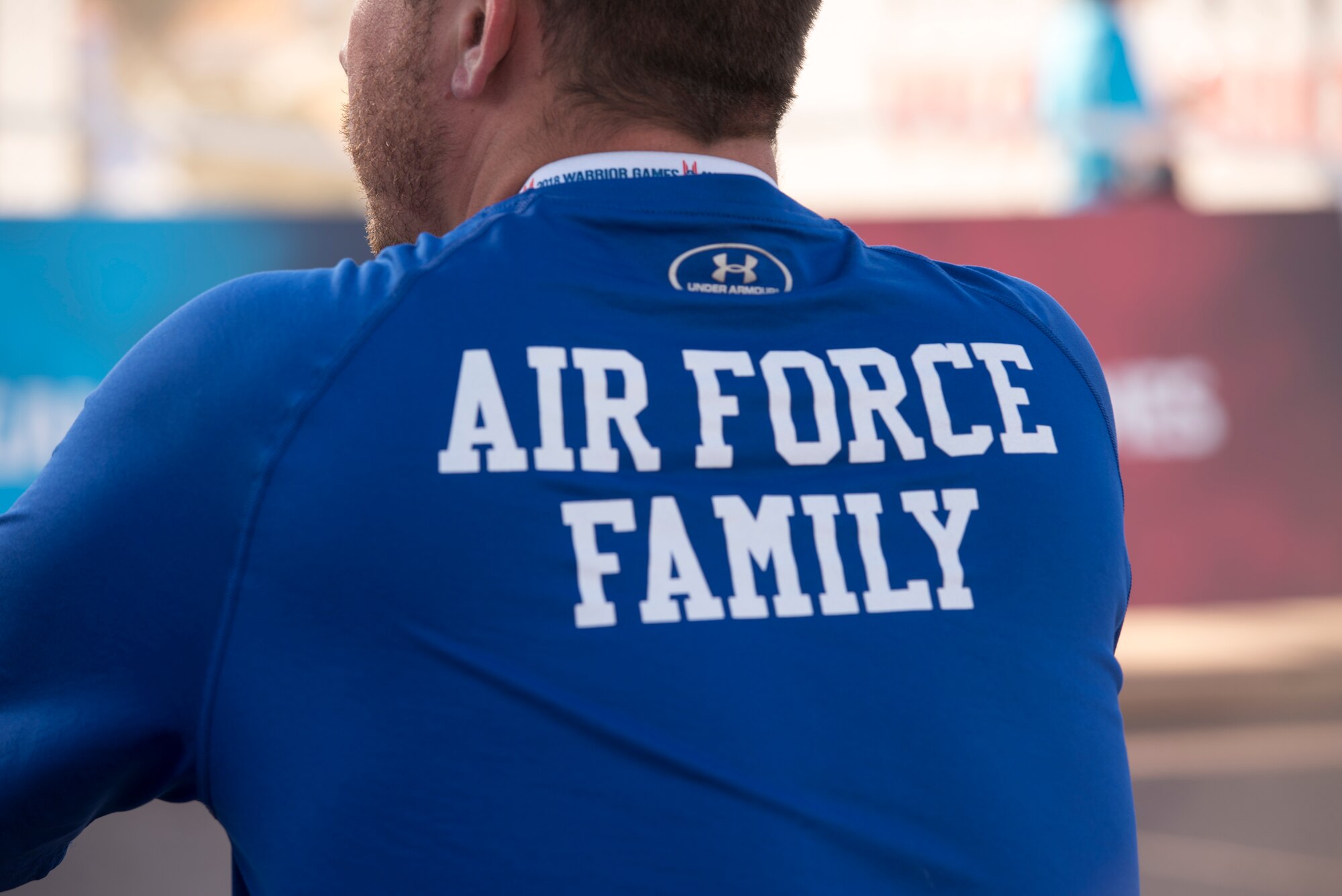 Tech. Sgt. Justin Goad, 49th Security Forces flight sergeant, watches the 2018 Department of Defense Warrior Games at the U.S. Air Force Academy in Colorado Springs, Colo. on June 6, 2018. His wife, Master Sgt. Lisa Goad, was one of the 40 athletes competing for Team Air Force. The Warrior Games were established in 2010 to enhance the recovery and rehabilitation of wounded, ill and injured service members through adaptive sports. (Courtesy photo)
