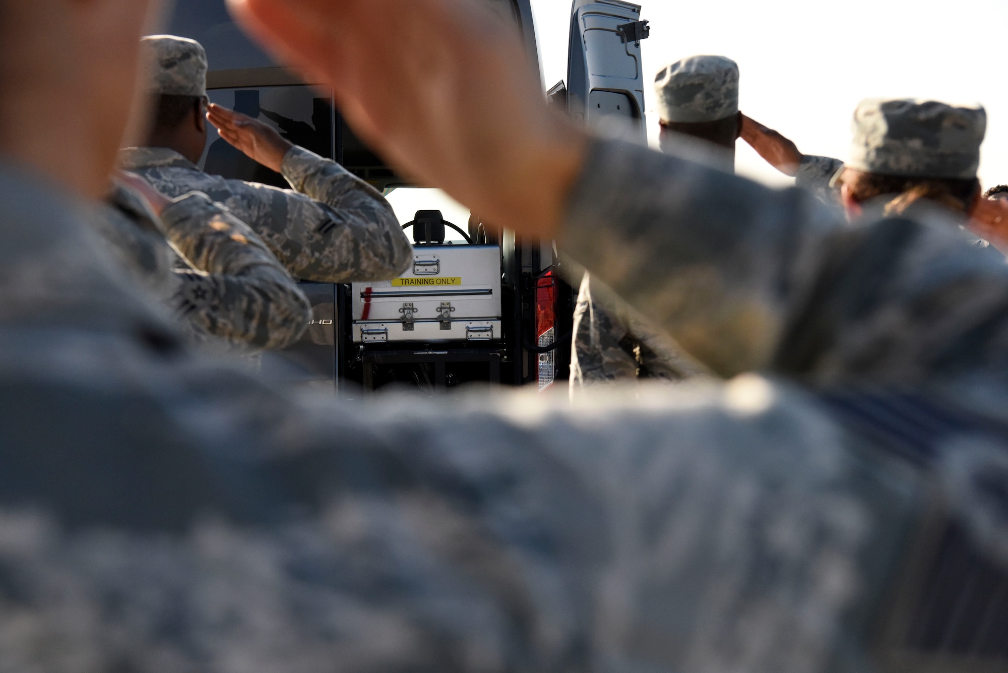 United States Air Force active duty and Reserve Airmen practice their movements during dignified transfer training for Air Force Mortuary Affairs Operations Aug. 23, 2018, at Dover Air Force Base, Del. A dignified transfer is the process by which, upon the return from the theater of operations to the United States, the remains of fallen military members are transferred from the aircraft to a waiting vehicle and then to the port mortuary. (U.S. Air Force photo by Airman 1st Class Zoe M. Wockenfuss)