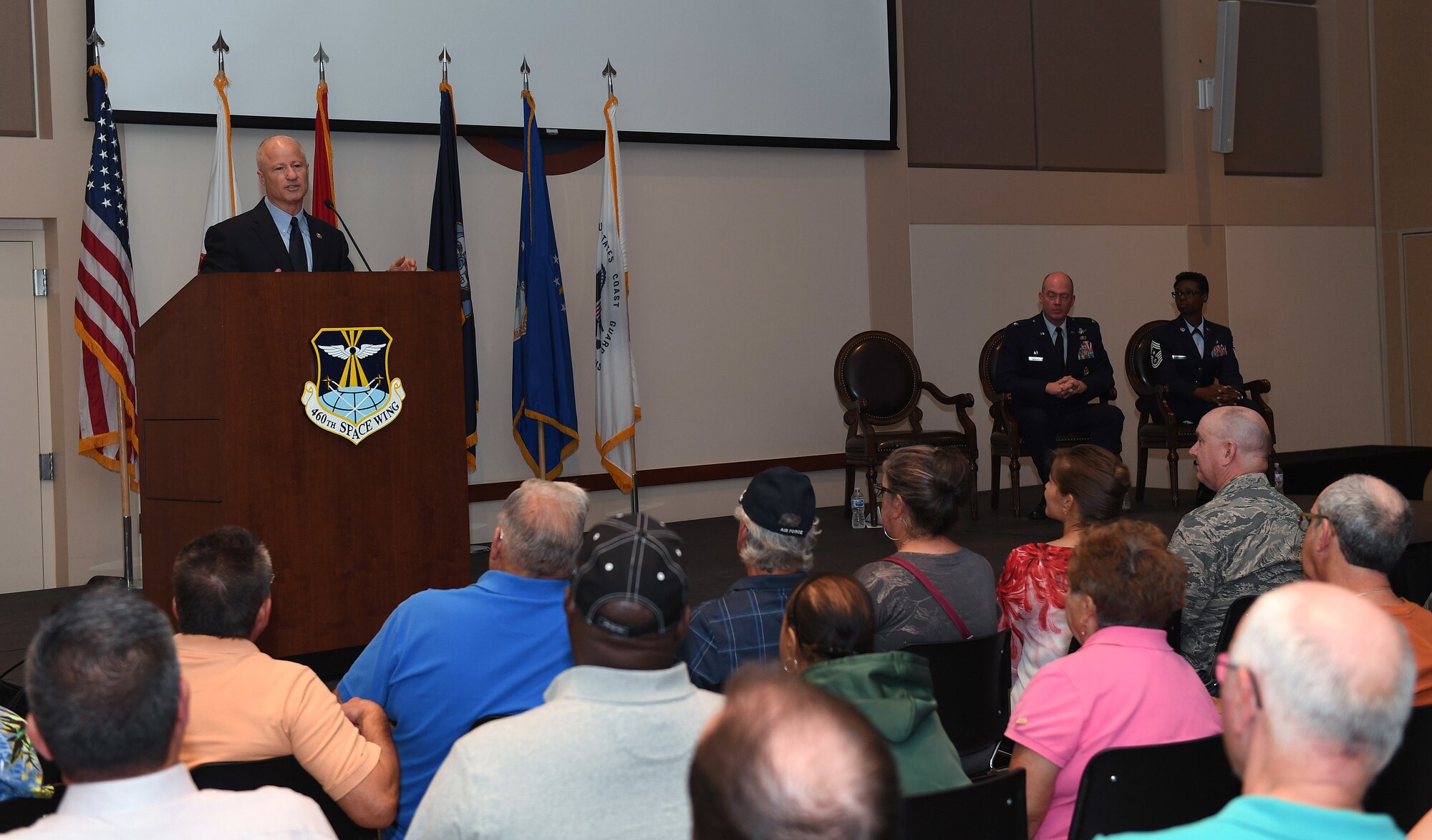 Congressman Mike Coffman, U.S. Representative for Colorado's 6th congressional district, shares his history of service then addresses concerns from the audience during the Retiree Appreciation Day event at Buckley Air Force Base, Colorado, Aug. 25, 2018.