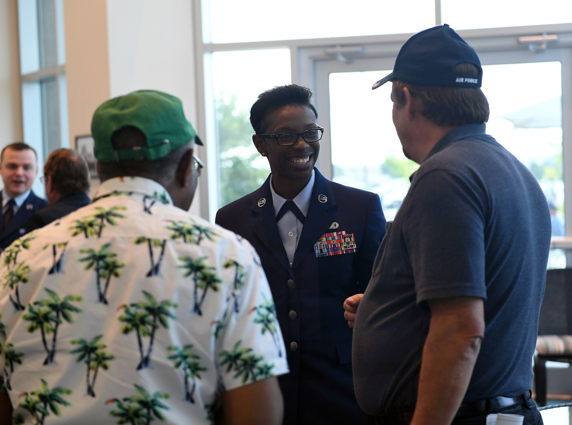 Chief Master Sgt. Tamar Dennis, 460th Space Wing command chief, speaks to attendees during the Retiree Appreciation Day event at Buckley Air Force Base, Colorado, Aug. 25, 2018.