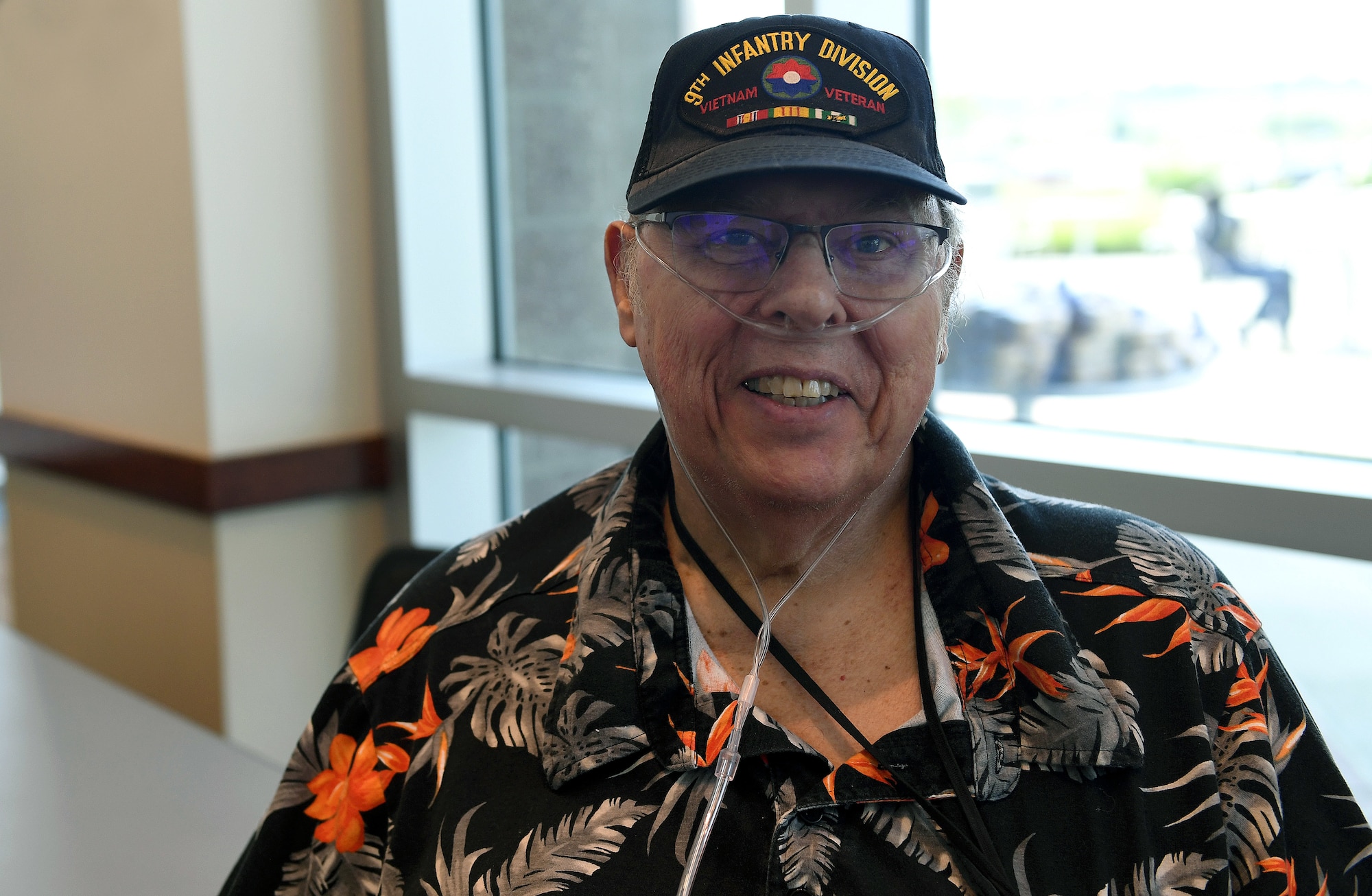 Retired Master Sgt. Don Benton, former Air Force Band French horn player, poses for a photo during the Retiree Appreciation Day event at Buckley Air Force Base, Colorado, Aug. 25, 2018.