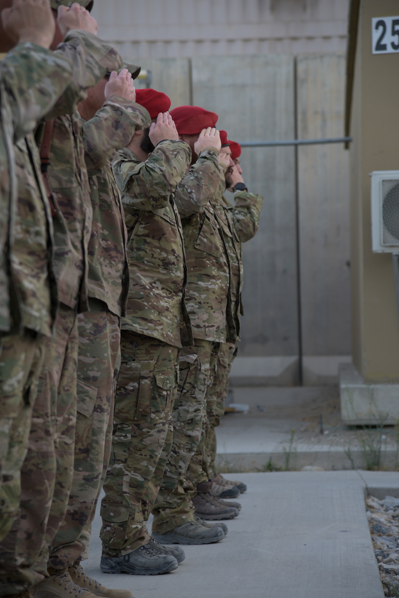 BAGRAM AIRFIELD, Afghanistan (August 28, 2018) -- Airmen salute during the Medal of Honor ceremony for U.S. Air Force Master Sgt. John Chapman on Bagram Airfield, Afghanistan, August 28, 2018. Chapman was posthumously awarded the MOH for his actions during the Battle of Takur Ghar, also known as Roberts Ridge, in Afghanistan in March 2002. (U.S. Air Force photo by Staff Sgt. Kristin High)